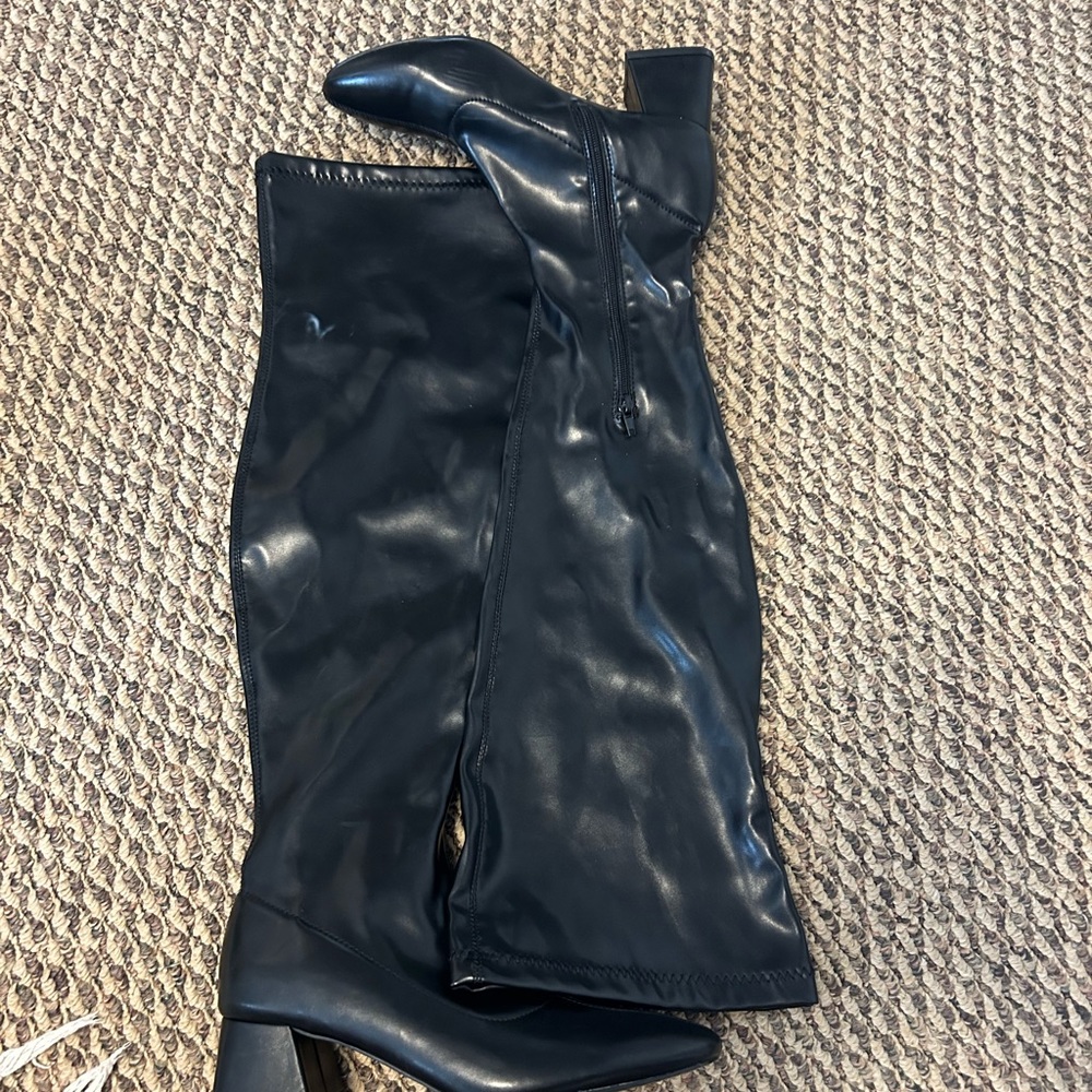 Tall black boots